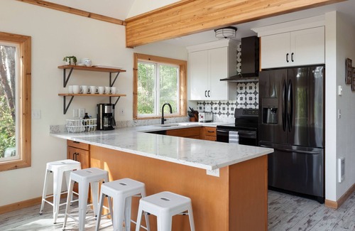Anderson Island House | Dog friendly cabin + hot tub, nestled amongst the trees
