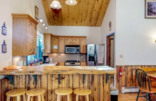 South Fork Cabin | Dog-friendly cabin with wood stove, private hot tub, & riverside firepit