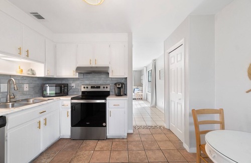 Gulf Breeze House | Dog-friendly coastal home with enclosed yard, firepit, grill, covered patio, AC