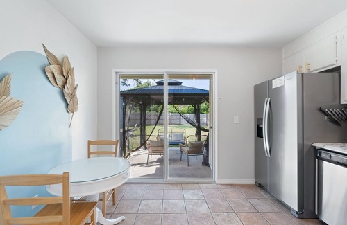 Gulf Breeze House | Dog-friendly coastal home with enclosed yard, firepit, grill, covered patio, AC
