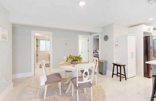 Isles of Capri Condo | Dog-friendly colorful condo with shaded patio, washer/dryer, & central AC