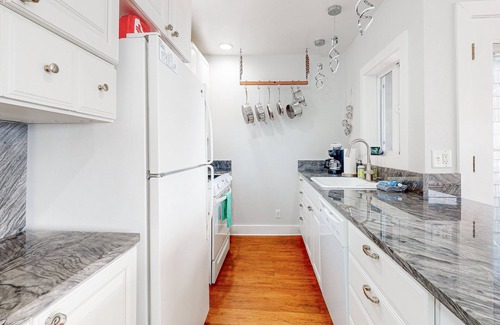 Oceanside Condo | Dog-friendly condo with ocean views, private balcony & great location