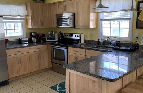 Dewey Beach Condo | DOG FRIENDLY *DELUXE OCEAN BLOCK CONDO* Steps to the Beach! *