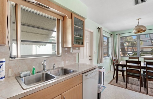 North Beach House | Dog-friendly duplex with communal patio, dining area, & grill