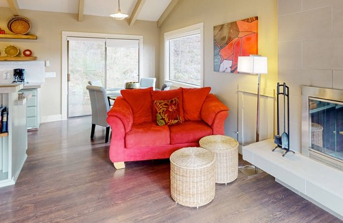 Orcas House | Dog-friendly forest cottage with a scenic deck, grill, fireplace, & central AC