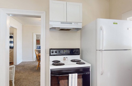 Harrison House | Dog-friendly getaway with large deck & lake view - walk to shops & marina
