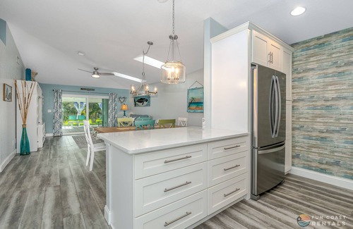 New Smyrna Beach House | Dog Friendly Home w/Private Fenced Yard, Garage & Fire Pit. STEPS to the Beach!