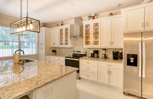 Legacy Park House | Dog-friendly home near Disney World with private pool, pool spa & washer/dryer