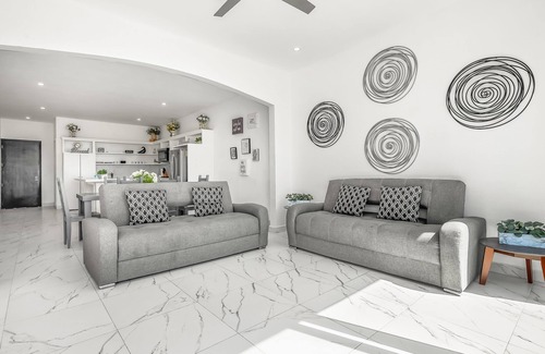 La Paloma House | Dog-friendly home with heated pool, hot tub, partial ocean views, & balcony