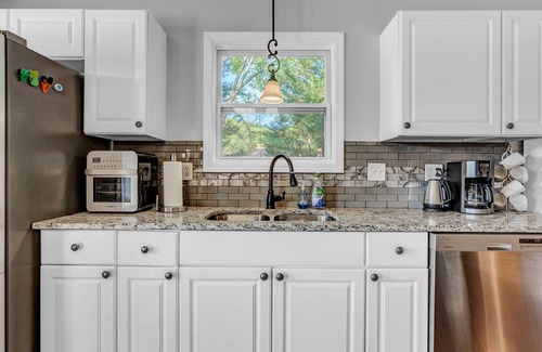 Snellville House | Dog-friendly lake house with dock, decks, firepit, grill, fireplace, & WiFi