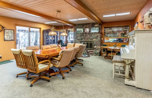 Polson House | Dog-friendly lakefront home & guest house with private beach, dock, & firepit