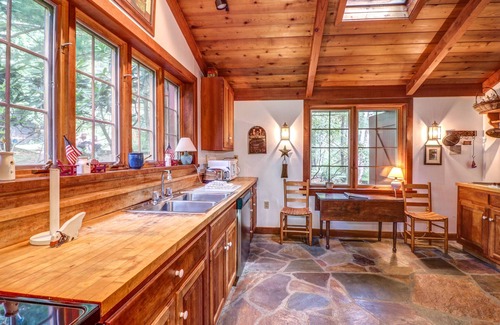 Blakeslee House | Dog-friendly Lakefront Log Home on a Quiet Cove with Front Deck & Private Dock