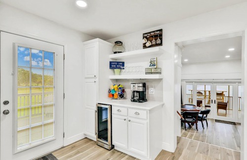 Sebring House | Dog-friendly lakefront home with fast WiFi, central AC, patio, & game room