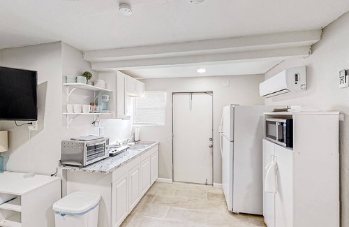 Bearss Plaza Apartment | Dog-friendly, lakeview retreat with kitchenette, yard, & electric grill