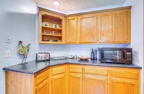 Central Lake House | Dog-Friendly Michigan Home w/Deck & Fire Pit!