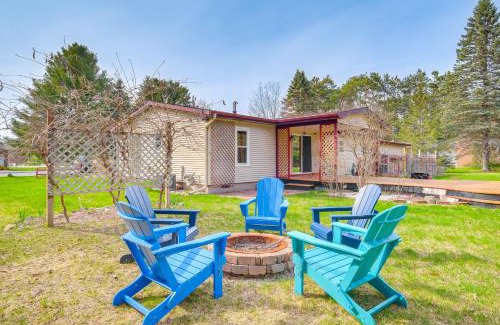 Central Lake House | Dog-Friendly Michigan Home with Deck and Fire Pit!