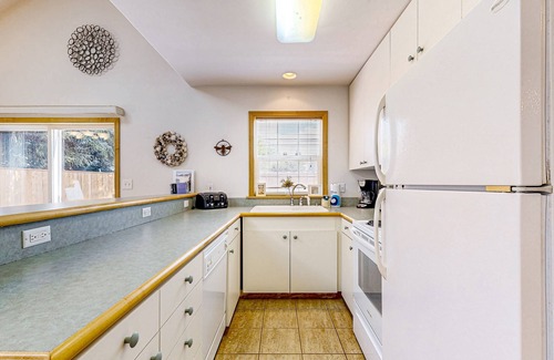 Nehalem House | Dog-friendly peaceful sanctuary with private hot tub, foosball, fireplace, W/D