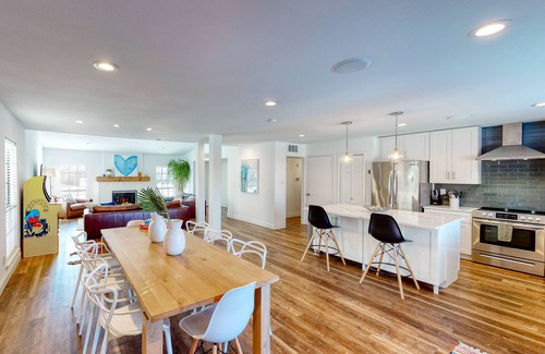The Colony House | Dog-friendly remodeled home with full kitchen, outdoor pool, & arcade games