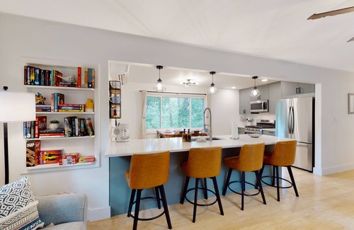Eureka Springs House | Dog-friendly retreat with an enclosed yard, firepit, games, and central AC