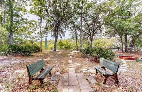 Bell House | Dog-friendly riverfront home - screened porch, 2 private docks, boat ramp access