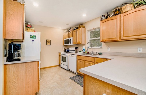 Honor House | Dog-friendly riverside retreat with canoe, kayaks, paddle-board, and wood stove