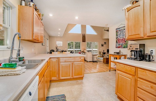 Honor House | Dog-friendly riverside retreat with canoe, kayaks, paddle-board, and wood stove