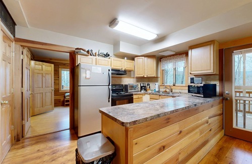 Whittier Cabin | Dog-friendly Smoky Mountain cabin with fireplace, charming deck & game loft