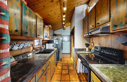Jackson Hole Cabin | Dog-friendly waterfront cabin on Flat Creek with wood stove, creek view, firepit