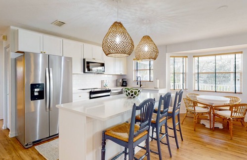 Redevelopment Area House | Dog-friendly waterfront home with extensive deck, canal views, lawn, W/D, AC