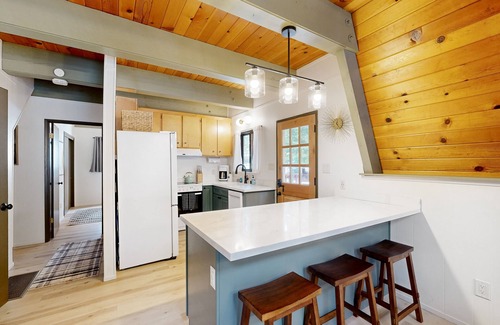 Arnold House | Dog-friendly wilderness retreat with pool, grill, circular fireplace, & W/D