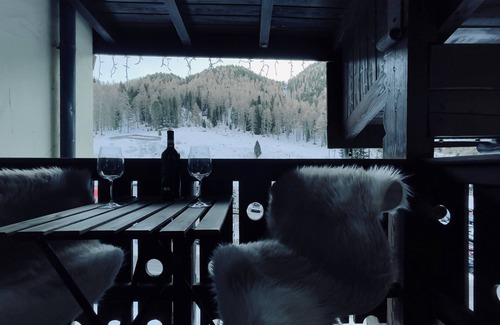 Tesero Apartment | Dolomiti Haus 300 ft from Pampeago ski lifts.