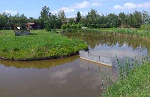 Ilawa Cabin | Domek letniskowy na Mazurach nad stawem