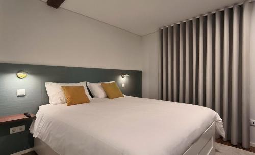 Guimaraes House | DOMI Suites & Studios