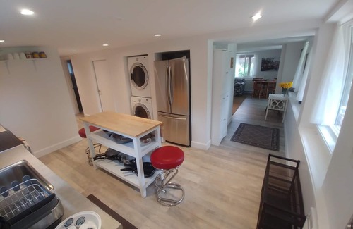 Sidney House | Dominion Brook Park Vacation Rental - Beautiful suite with garden/park views.