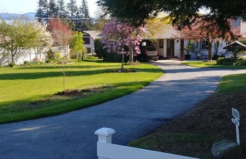 Sidney House | Dominion Brook Park Vacation Rental - Beautiful suite with garden/park views.