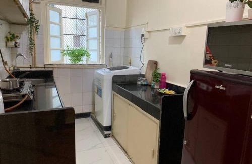 Khar Apartment | Dominos 1 BHK Apartment, Near Carter Road by Connket Homes