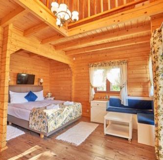 Wiartel Resort | Domki Mazurskie w Ogrodach Złotej Łani Wiartel - Klimatyczne Apartamenty i Pokoje Widokowe