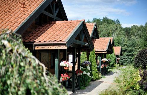Wiartel Resort | Domki Mazurskie w Ogrodach Złotej Łani Wiartel - Klimatyczne Apartamenty i Pokoje Widokowe