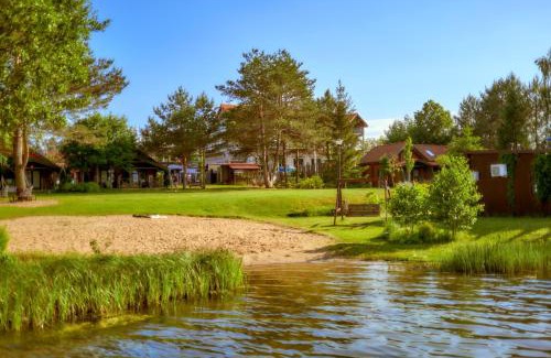 Wiartel Resort | Domki Mazurskie w Ogrodach Złotej Łani Wiartel - Klimatyczne Apartamenty i Pokoje Widokowe