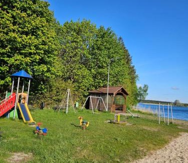 Wdzydze Tucholskiez Resort | Domki nad Kukówkiem