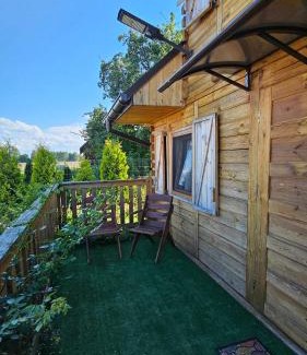 gmina Sułow House | Domki nad Nieliszem- dom kwiatowy