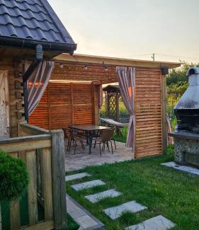 gmina Sułow House | Domki nad Nieliszem- dom kwiatowy