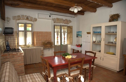 San Giovanni Suergiu House | Domusantiga Apartments 2 DOUBLE BEDROOMS, GREEN MEADOW, by the sea