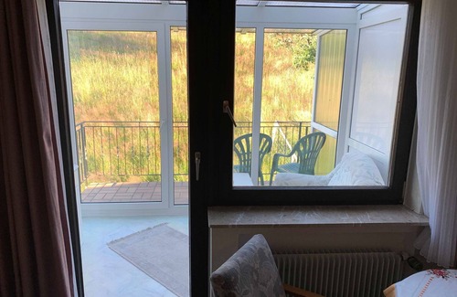 Reichelsheim Cottage | Doppelzimmer mit Wintergarten - 36 - Gasthaus und Pension Zum Fürstengrund