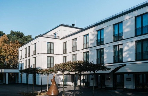 Bad Saarow Apartment | Doppelzimmer Terrasse, Dusche/WC - Velotel Bad Saarow