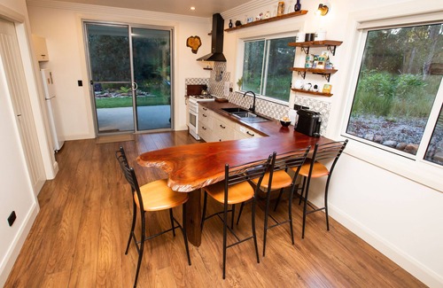 Deer Vale Cabin | Dorrigo accommodation, twin outdoor baths under the stars,120 ac. river & walks