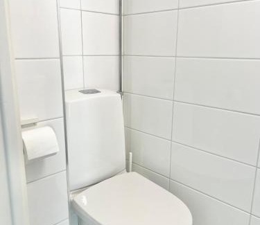 Koillinen District House | Double bed room in An apartment with lovely cats