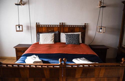Belluno Apartment | Double bedroom, kitchen, bathroom in organic farm