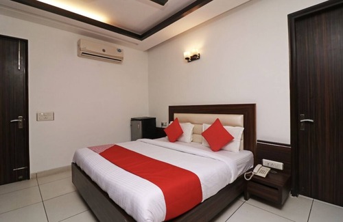 DLF Phase 3 Hotel | Double Deluxe Room @ Sterling Hotel Rooms With Balcony Near Dlf Ambience Mall