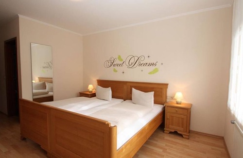 Plutscheid Bed & Breakfast | Double room with shower/WC and balcony - Gasthaus-Pension-Rest. Bucket